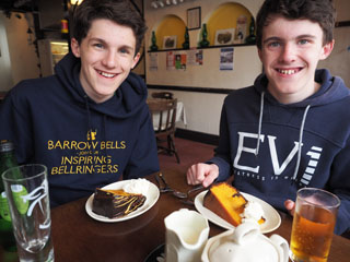Lads about to tuck into warm chocolate orange cake with cream