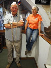 Ken with tenor rope, and Clarissa sits on banister beside him
