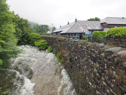 Church Beck is running fast beside the Ruskin Museum in Coniston